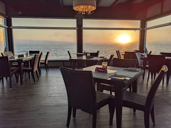 Elegant dining area at The Jetty 1905 overlooking the ocean